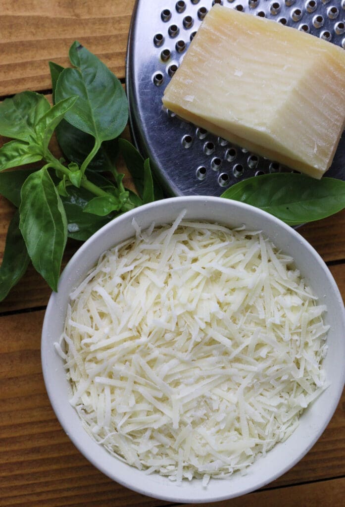 image of how to grate the grana padano cheese for pesto